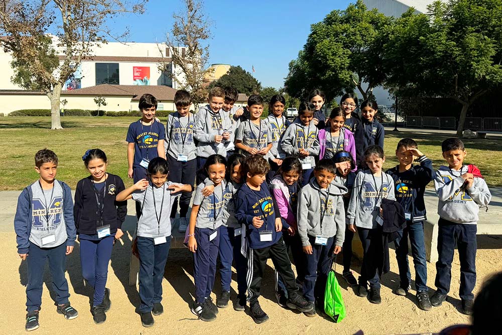 minaret academy students lined up for photo
